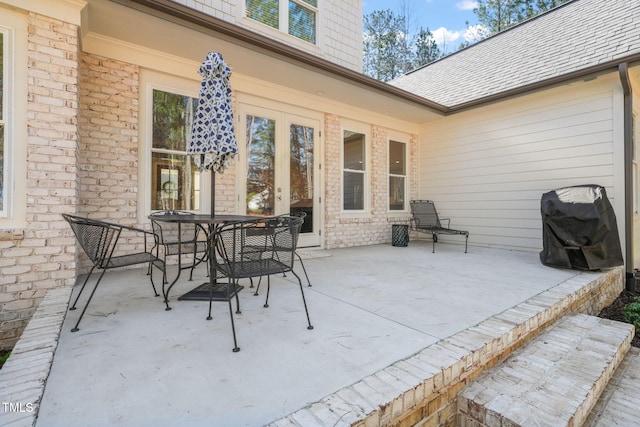 56 Mist Wood Ct, Pittsboro, NC 27312 - view of patio featuring a grill and outdoor dining area