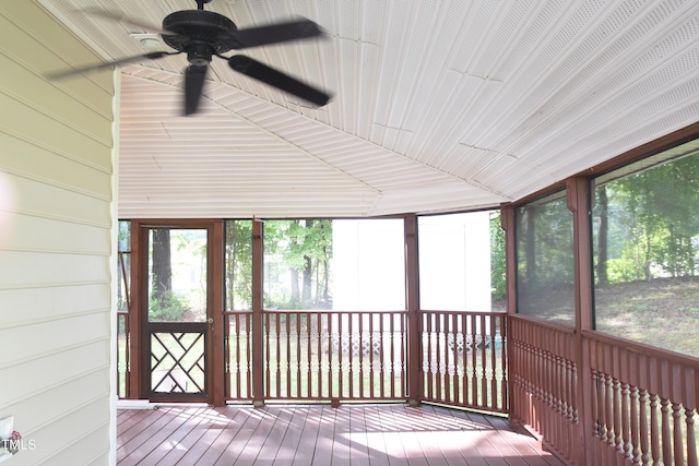 sunroom with a ceiling fan