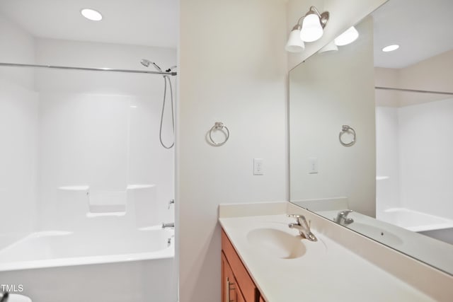 full bath with recessed lighting, vanity, and shower / tub combination