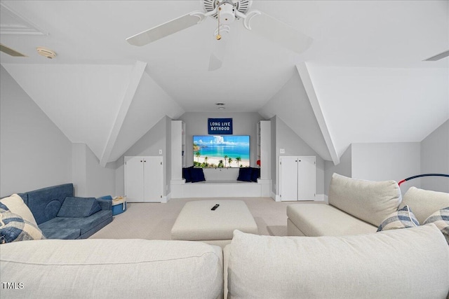 living area with lofted ceiling, a ceiling fan, visible vents, and light colored carpet