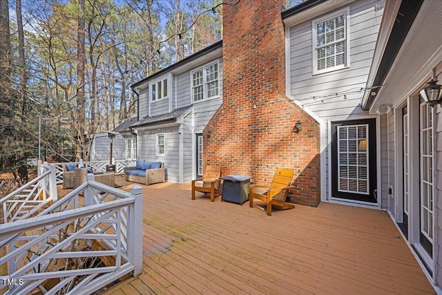 deck with outdoor lounge area