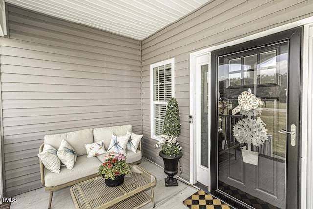 doorway to property featuring an outdoor hangout area