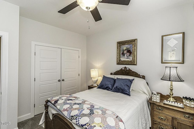 bedroom with carpet flooring, a closet, baseboards, and ceiling fan