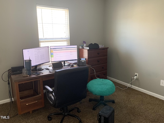 carpeted office featuring baseboards