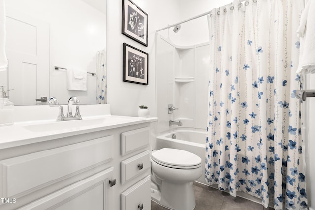 full bathroom featuring tile patterned floors, shower / bath combo with shower curtain, toilet, and vanity