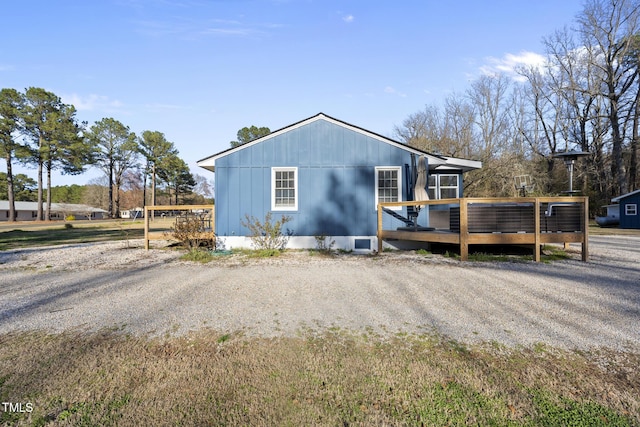 352 Leonard Rd, Louisburg, NC 27549 - view of front facade with a wooden deck
