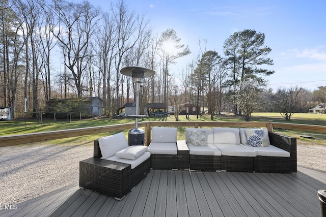 352 Leonard Rd, Louisburg, NC 27549 - deck with an outdoor living space and a lawn