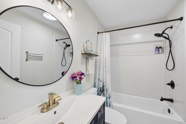 352 Leonard Rd, Louisburg, NC 27549 - full bathroom featuring vanity, toilet, and shower / bathtub combination with curtain