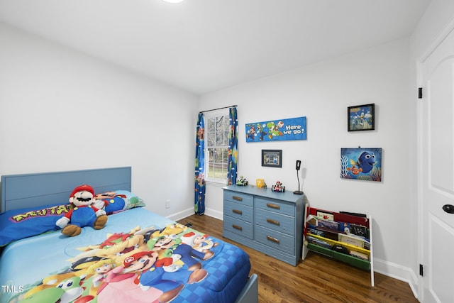 352 Leonard Rd, Louisburg, NC 27549 - bedroom featuring dark wood finished floors and baseboards