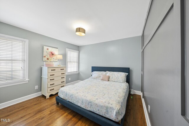 352 Leonard Rd, Louisburg, NC 27549 - bedroom featuring baseboards and wood finished floors