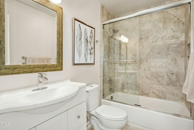 full bath with toilet, combined bath / shower with glass door, and vanity