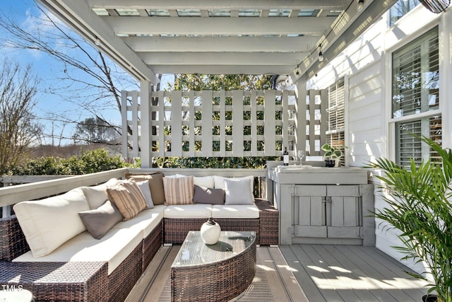 wooden deck with an outdoor living space