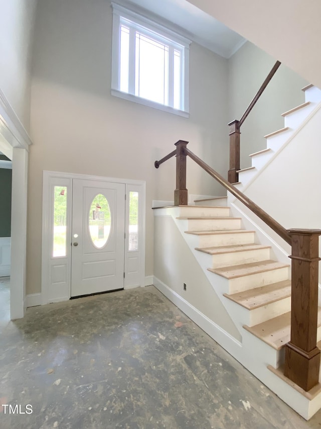 1663 Keith Hills Rd, Lillington, NC 27546 - foyer entrance featuring stairway, baseboards, plenty of natural light, and a towering ceiling