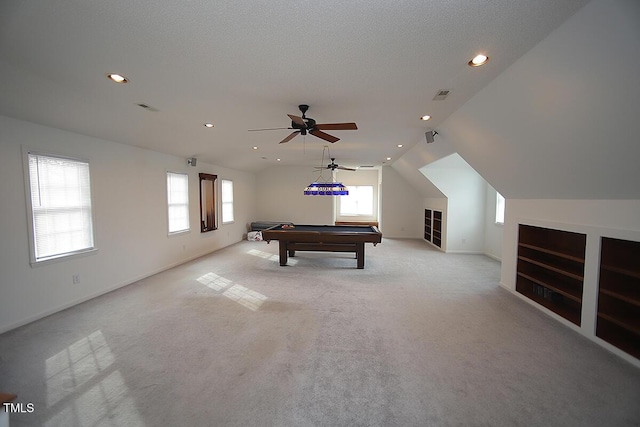 playroom with light carpet, visible vents, vaulted ceiling, and pool table