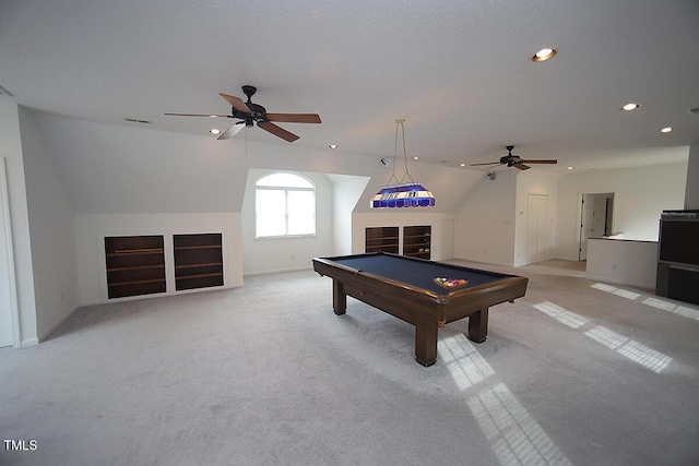 rec room featuring recessed lighting, light colored carpet, visible vents, and a textured ceiling