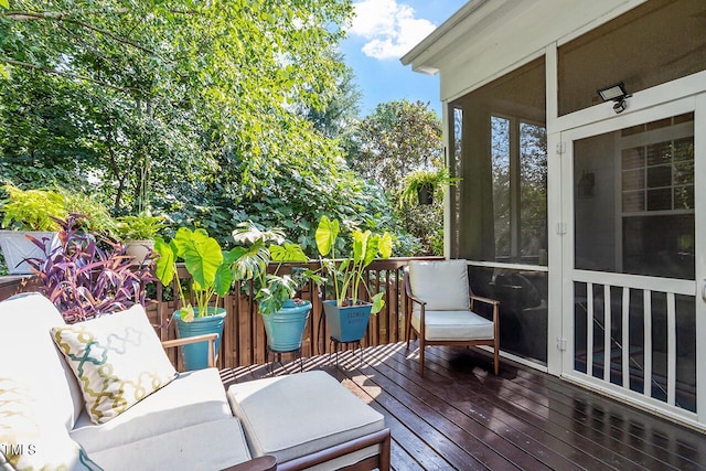 wooden terrace with a sunroom