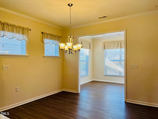 unfurnished dining area featuring dark wood-style floors, visible vents, ornamental molding, and baseboards