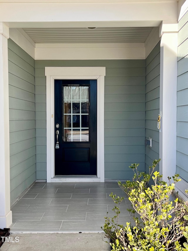 entrance to property with covered porch