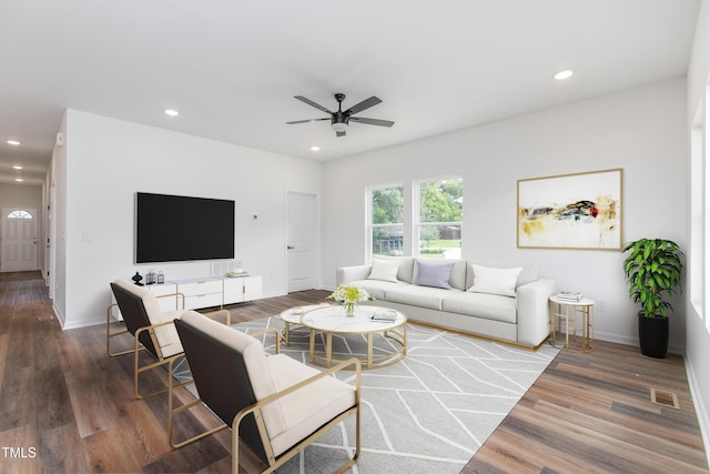 living room with baseboards, visible vents, ceiling fan, wood finished floors, and recessed lighting