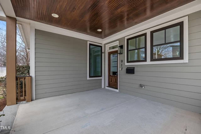 doorway to property with a porch