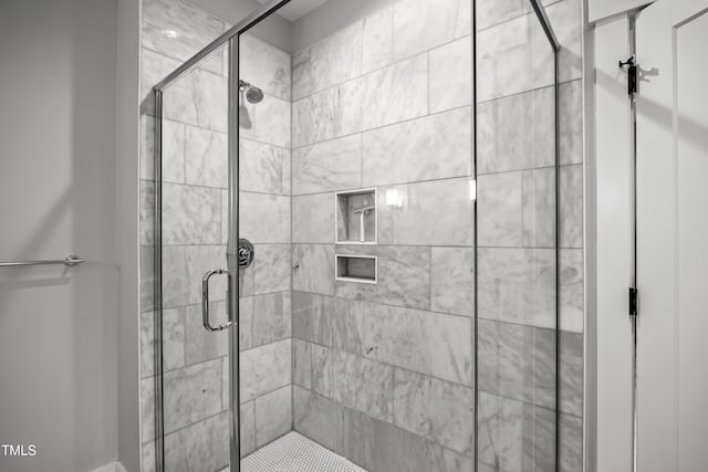 bathroom with a stall shower