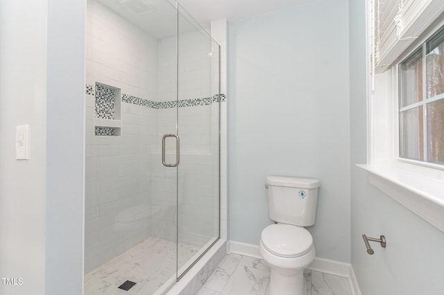 bathroom featuring baseboards, toilet, marble finish floor, and a shower stall