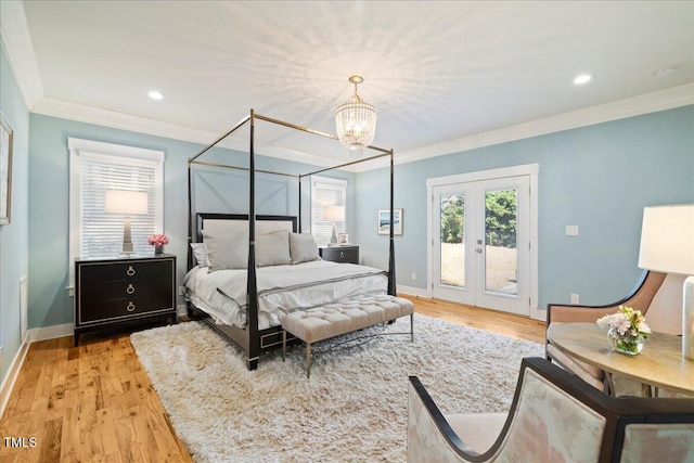 bedroom with access to exterior, baseboards, light wood-style floors, and crown molding