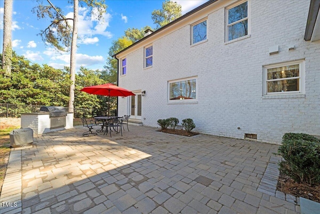 view of patio with area for grilling