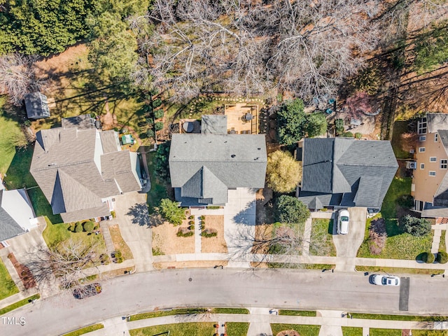 birds eye view of property with a residential view