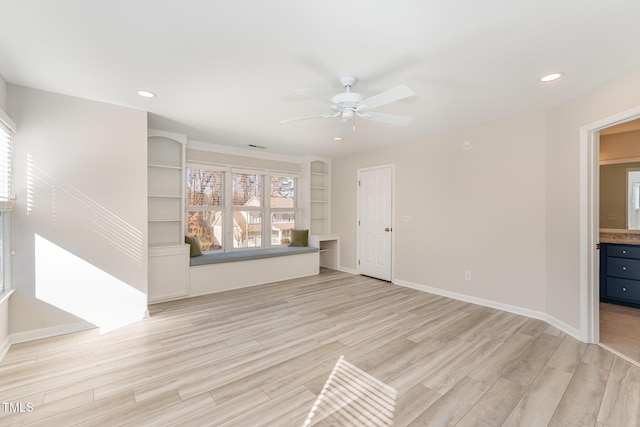 unfurnished living room with ceiling fan, light wood finished floors, recessed lighting, and baseboards