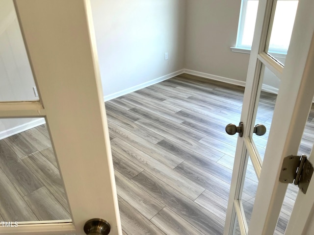 detailed view of wood finished floors and baseboards