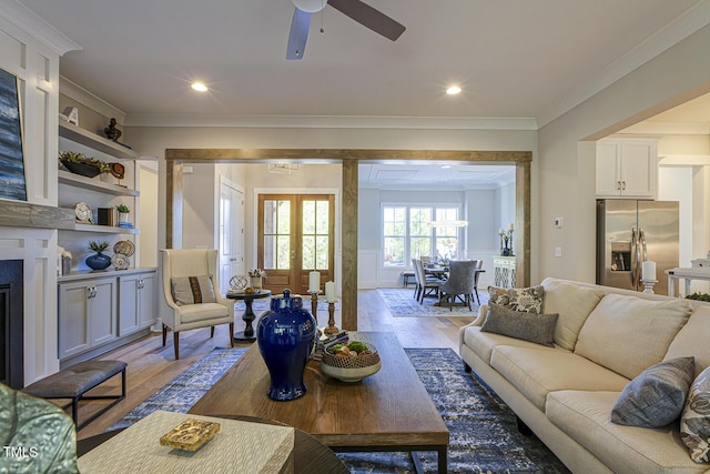 25 Blackhorn Ct, Pittsboro, NC 27312 - living area with a ceiling fan, light wood-type flooring, french doors, and crown molding