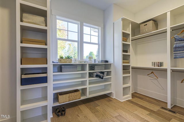 25 Blackhorn Ct, Pittsboro, NC 27312 - walk in closet featuring wood finished floors and visible vents