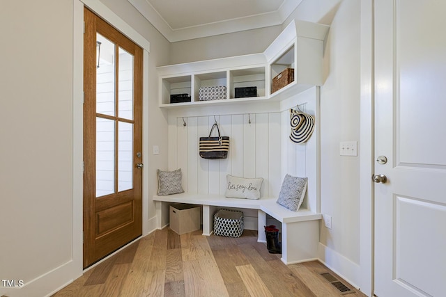 25 Blackhorn Ct, Pittsboro, NC 27312 - mudroom featuring ornamental molding, visible vents, and light wood-style floors