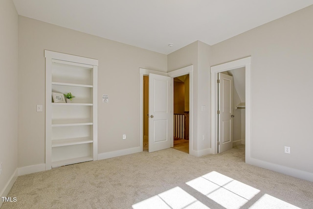 25 Blackhorn Ct, Pittsboro, NC 27312 - unfurnished bedroom with light carpet, a spacious closet, a closet, and baseboards