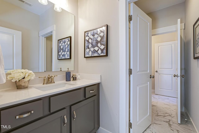 25 Blackhorn Ct, Pittsboro, NC 27312 - bathroom with marble finish floor, visible vents, vanity, and baseboards