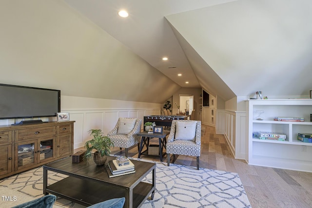 25 Blackhorn Ct, Pittsboro, NC 27312 - living area featuring vaulted ceiling, a decorative wall, light wood-style flooring, and recessed lighting