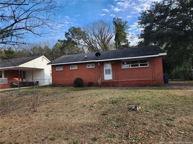 421 Durant Dr, Fayetteville, NC 28304 - view of front facade featuring brick siding and a front lawn