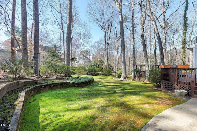 view of yard featuring a deck