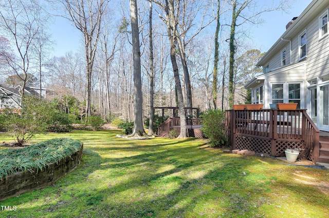 view of yard featuring a deck