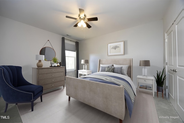 bedroom with visible vents and a ceiling fan