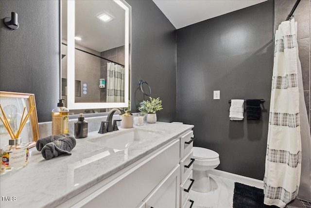 full bath with marble finish floor, baseboards, vanity, and toilet