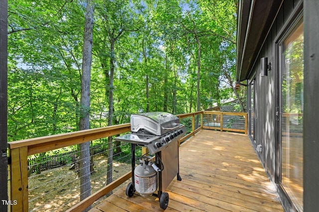 wooden terrace with grilling area