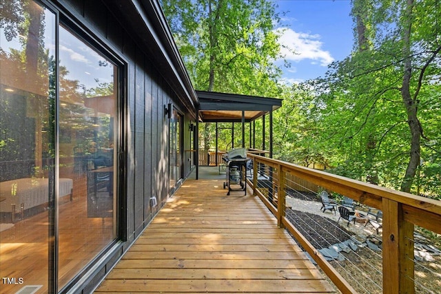 wooden deck with area for grilling