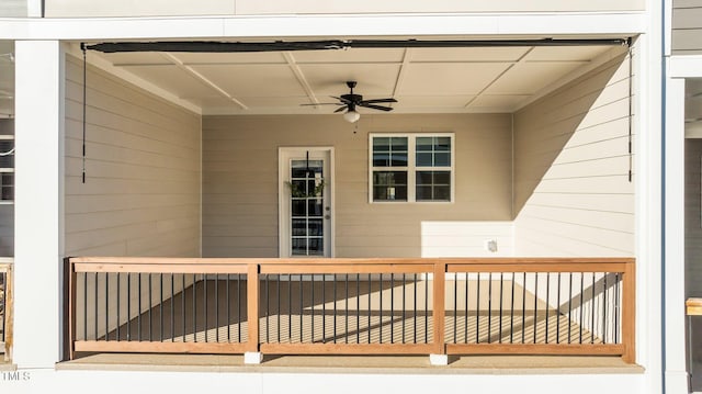 property entrance featuring ceiling fan