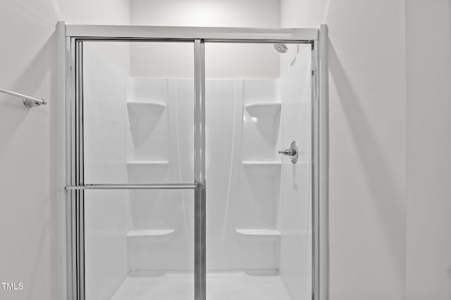 bathroom with a stall shower