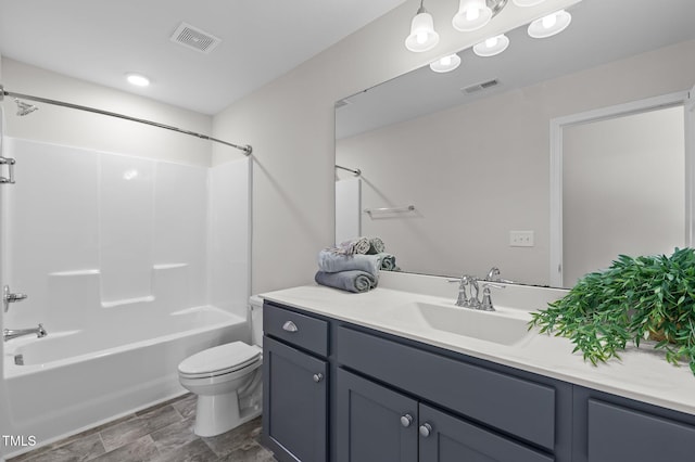 bathroom with toilet, shower / tub combination, vanity, and visible vents