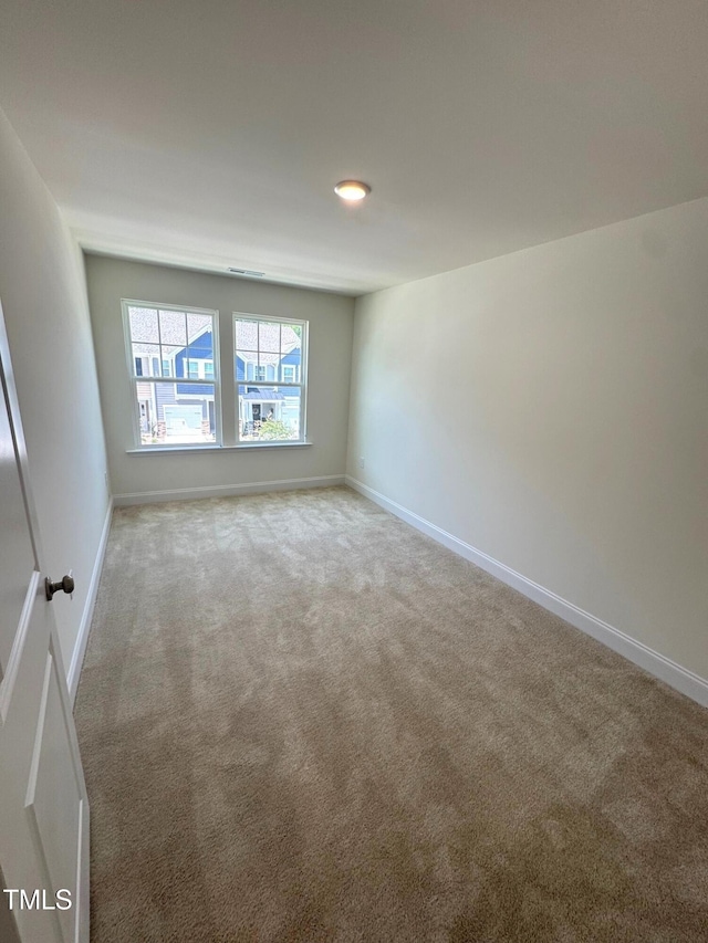 332 Church St Unit 45, Wendell, NC 27591 - carpeted spare room featuring baseboards