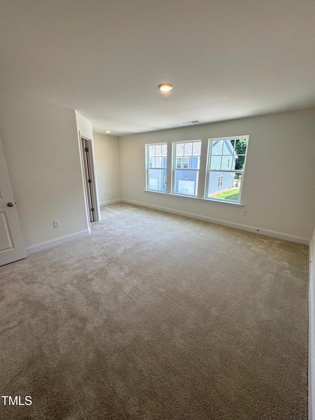 332 Church St Unit 45, Wendell, NC 27591 - unfurnished room featuring light colored carpet, baseboards, and recessed lighting
