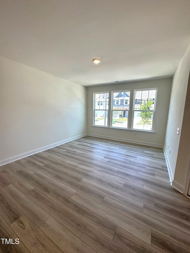 332 Church St Unit 45, Wendell, NC 27591 - unfurnished room with wood finished floors and baseboards